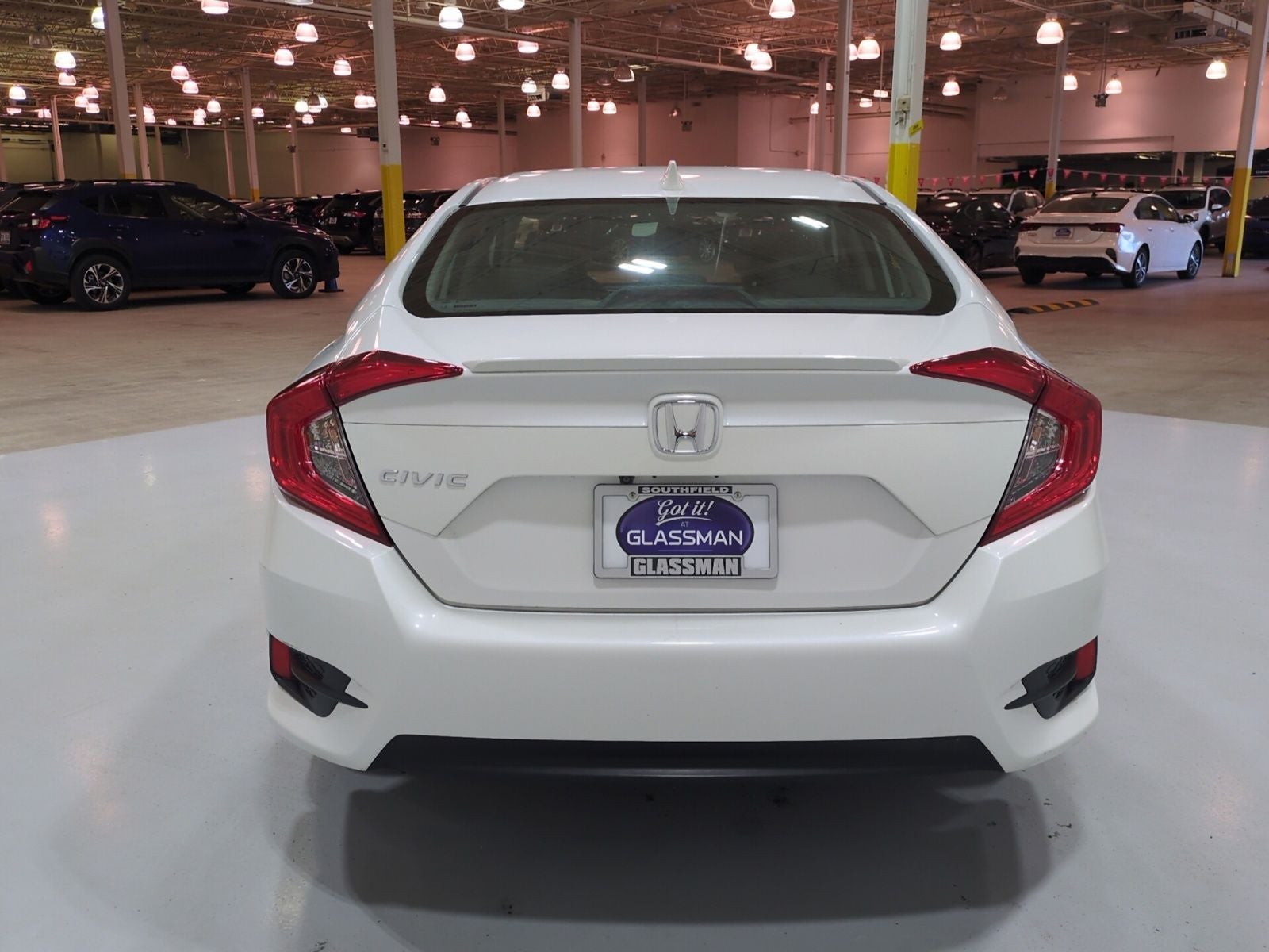 2016 Honda Civic — rear three-quarter view