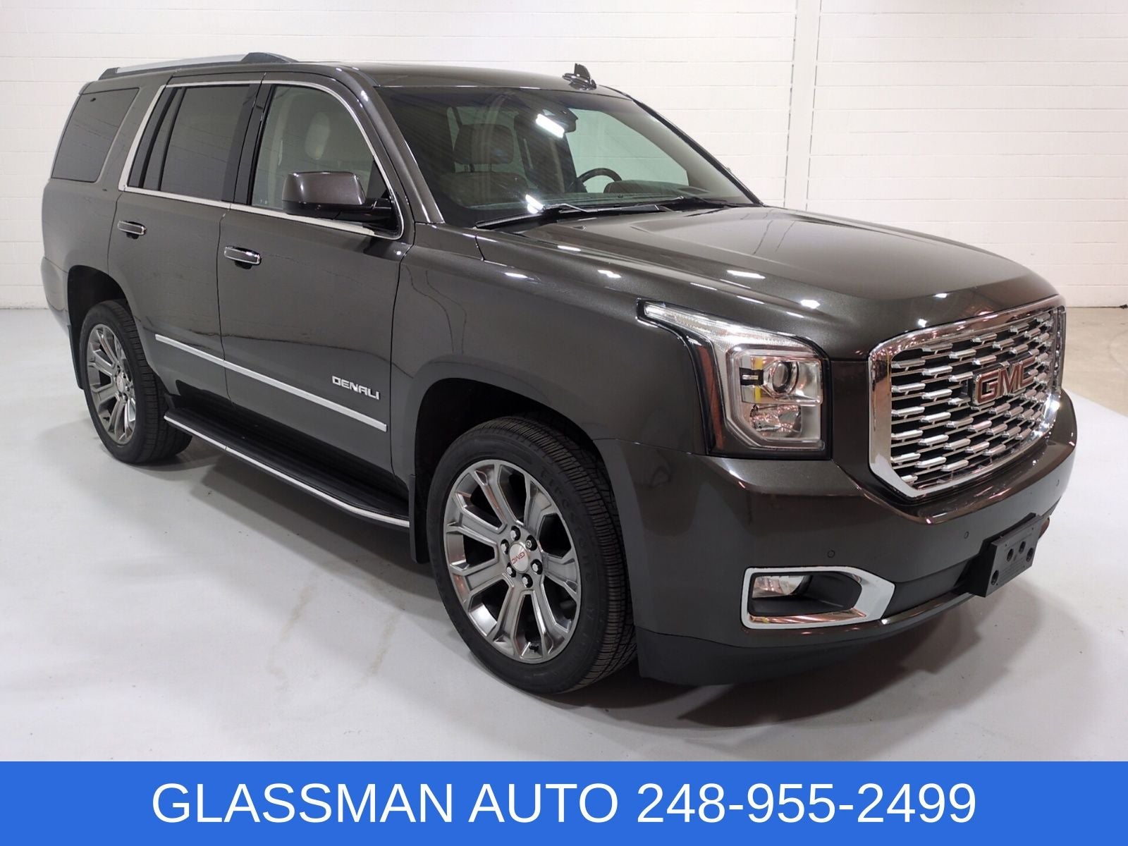 2019 GMC Yukon Denali in Smokey Quartz Metallic — front three-quarter view