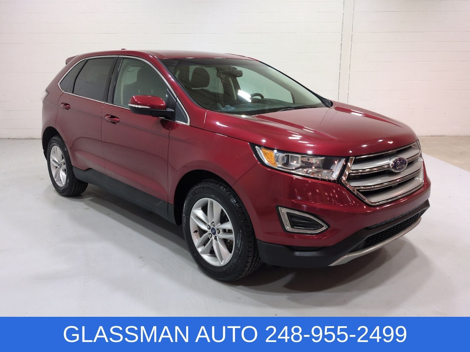 2017 Ford Edge SEL in Ruby Red Metallic — front three-quarter view