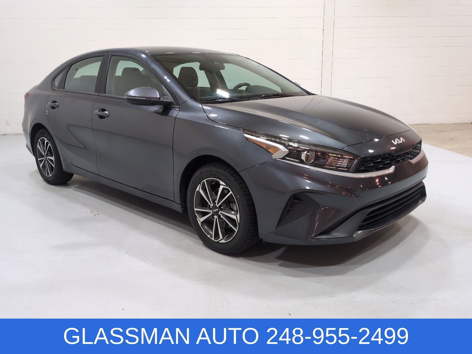 2024 Kia Forte LXS in Gravity Gray — front three-quarter view