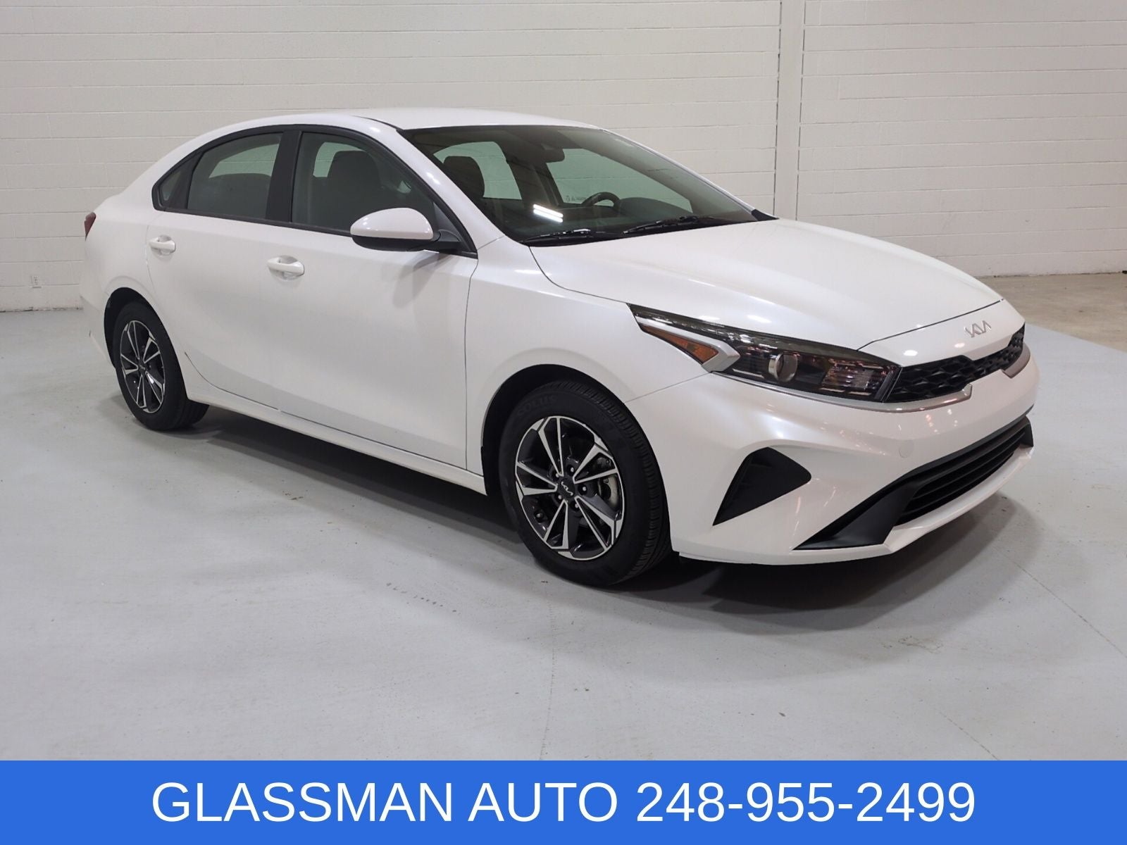 2024 Kia Forte LXS in Snow White Pearl — front three-quarter view
