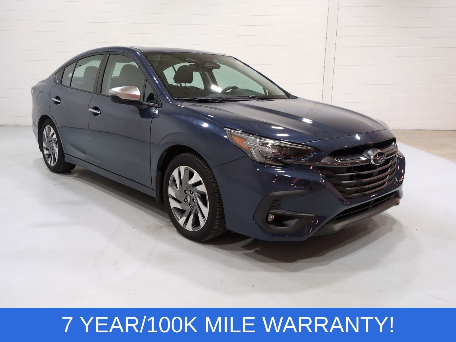 2024 Subaru Legacy Touring XT in Cosmic Blue — front three-quarter view