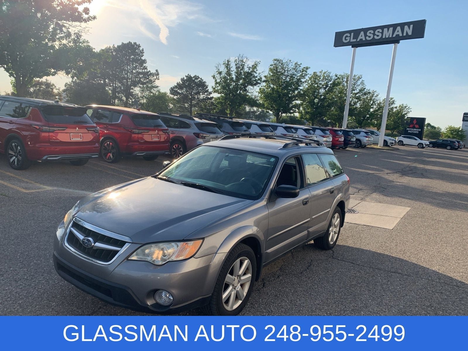 2009 Subaru Outback 2.5i in Gray — front three-quarter view