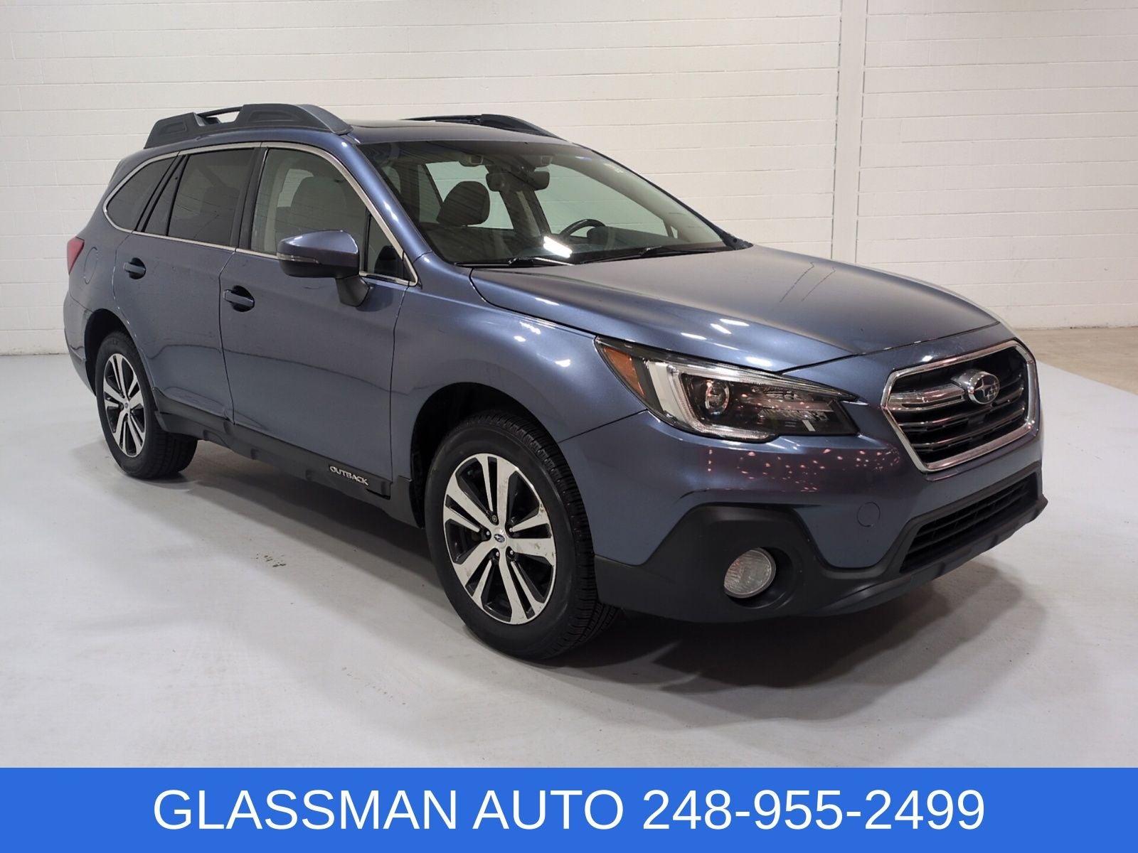 2018 Subaru Outback 2.5i Limited in Twilight Blue Metallic — front three-quarter view