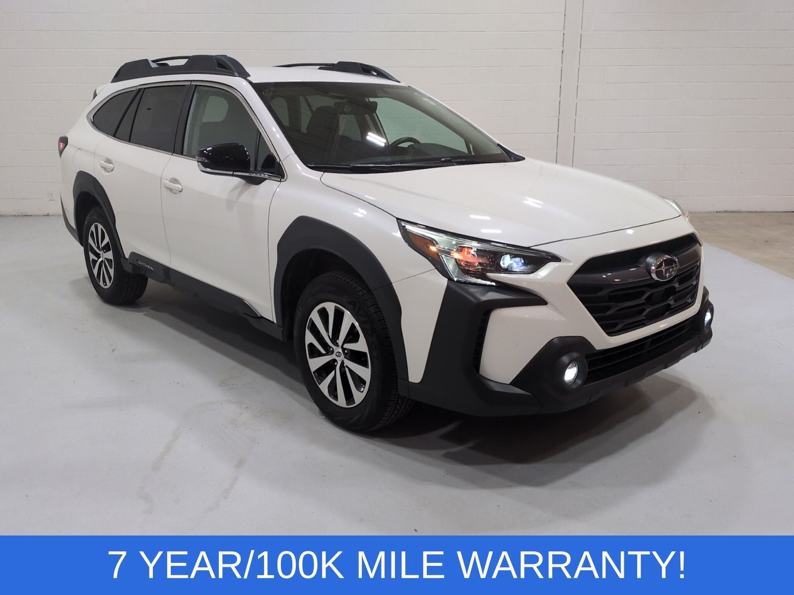 2025 Subaru Outback Premium in Crystal White Pearl — front three-quarter view