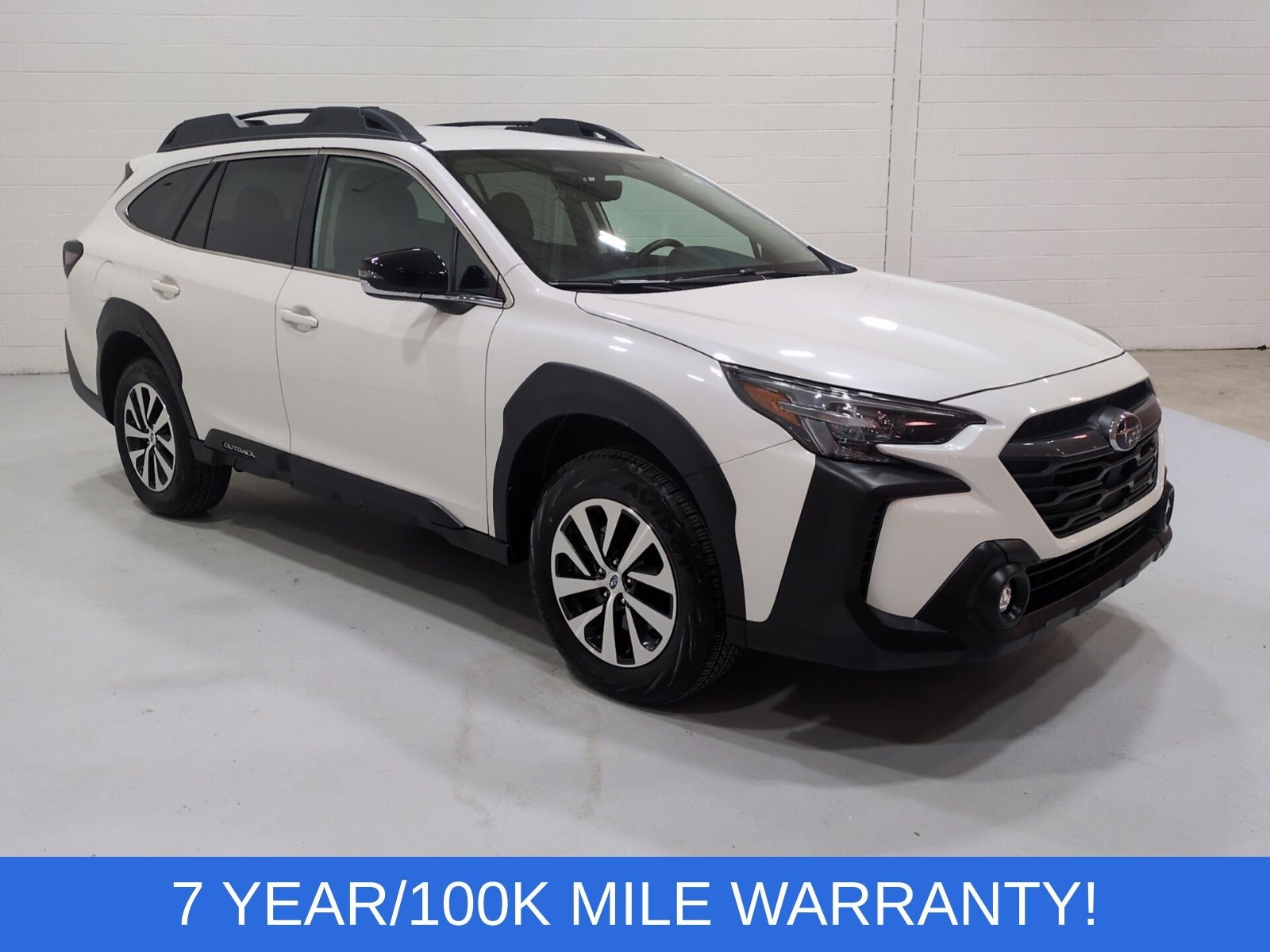 2025 Subaru Outback Premium in Crystal White Pearl — front three-quarter view