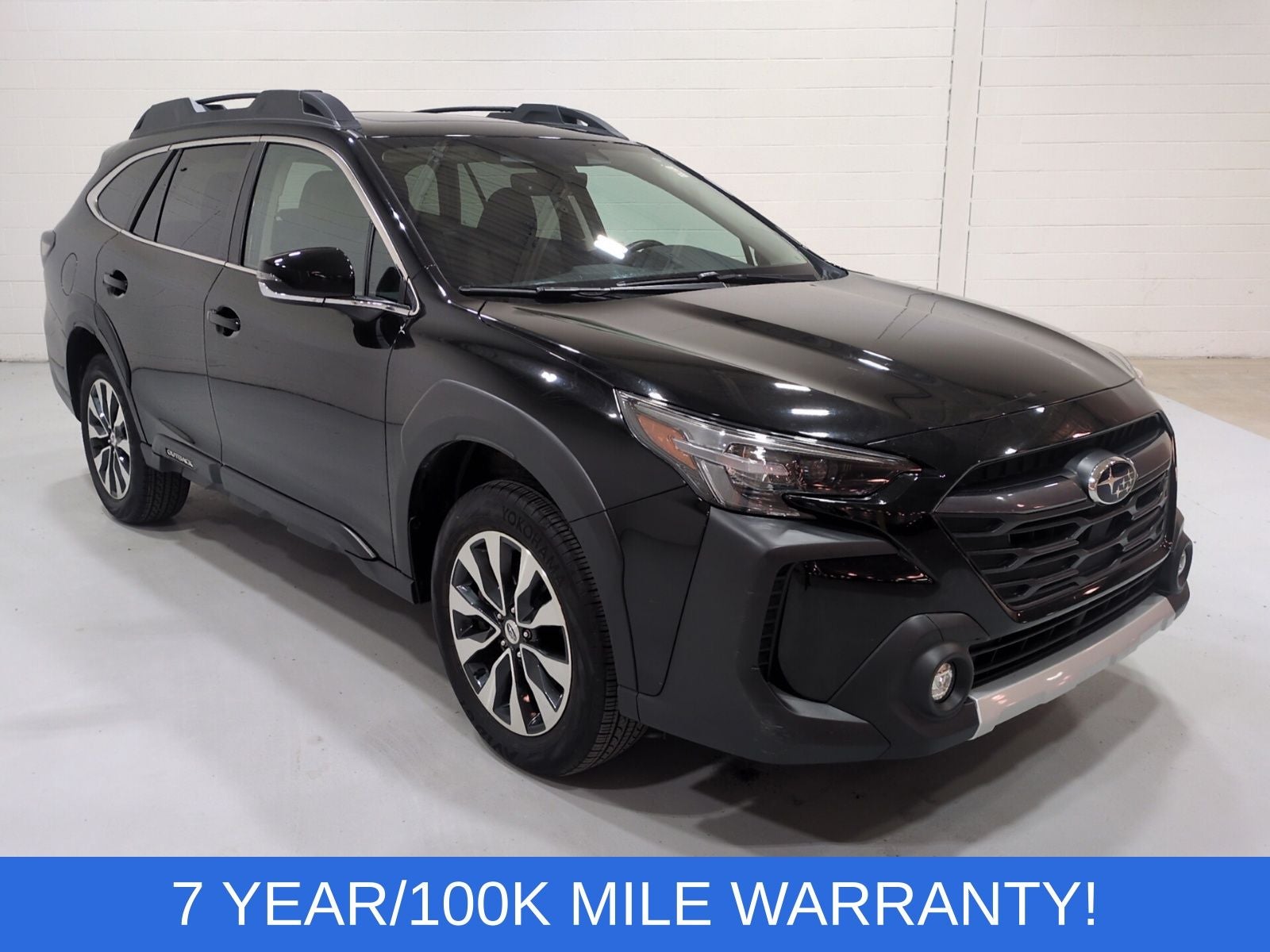 2024 Subaru Outback Limited in Crystal Black Silica — front three-quarter view