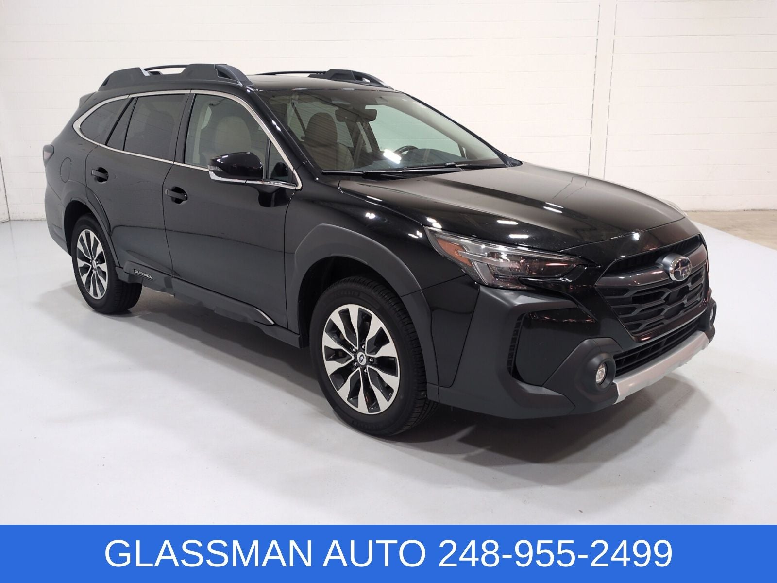 2024 Subaru Outback Limited in Crystal Black Silica — front three-quarter view
