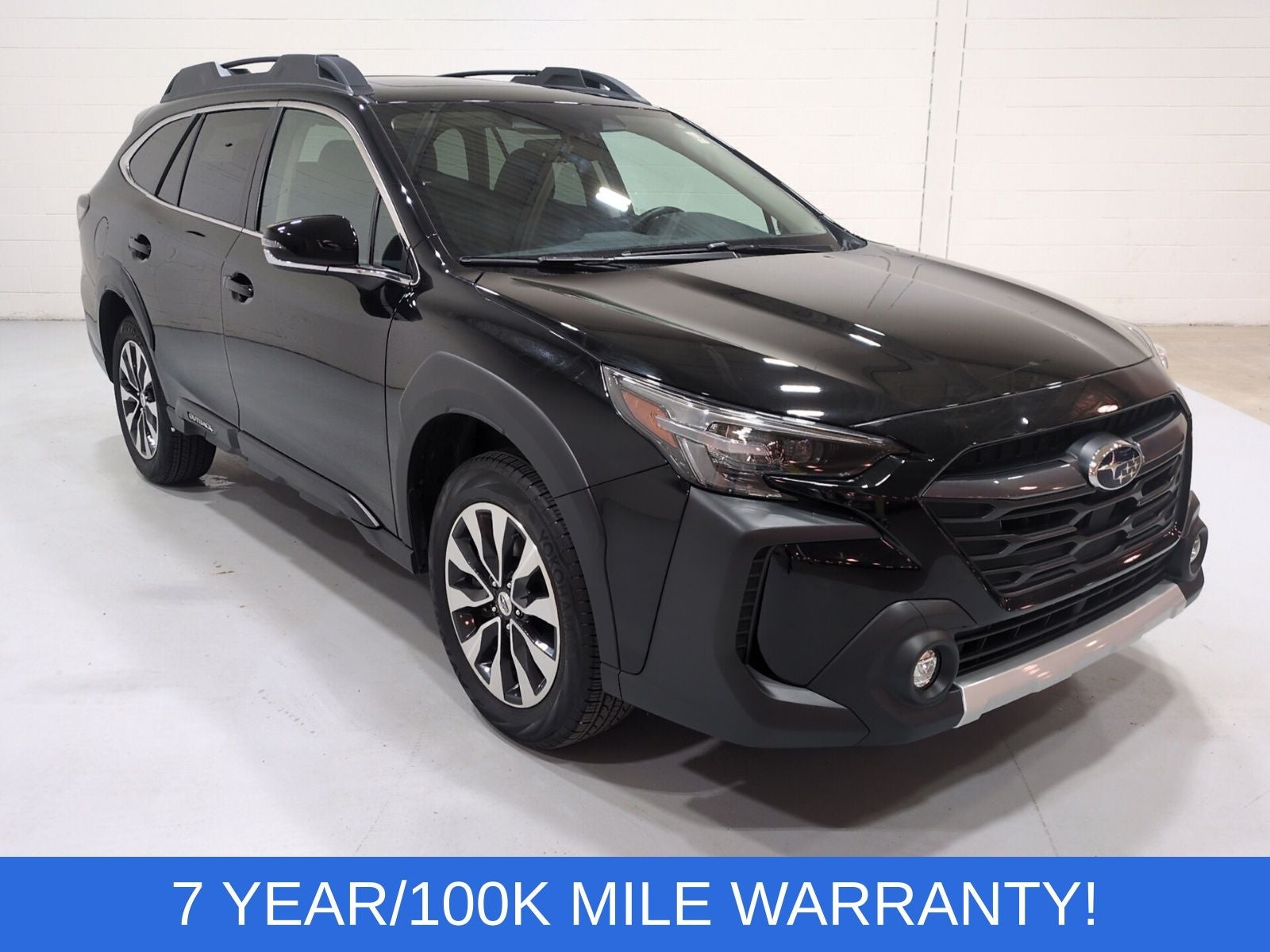 2024 Subaru Outback Limited in Crystal Black Silica — front three-quarter view
