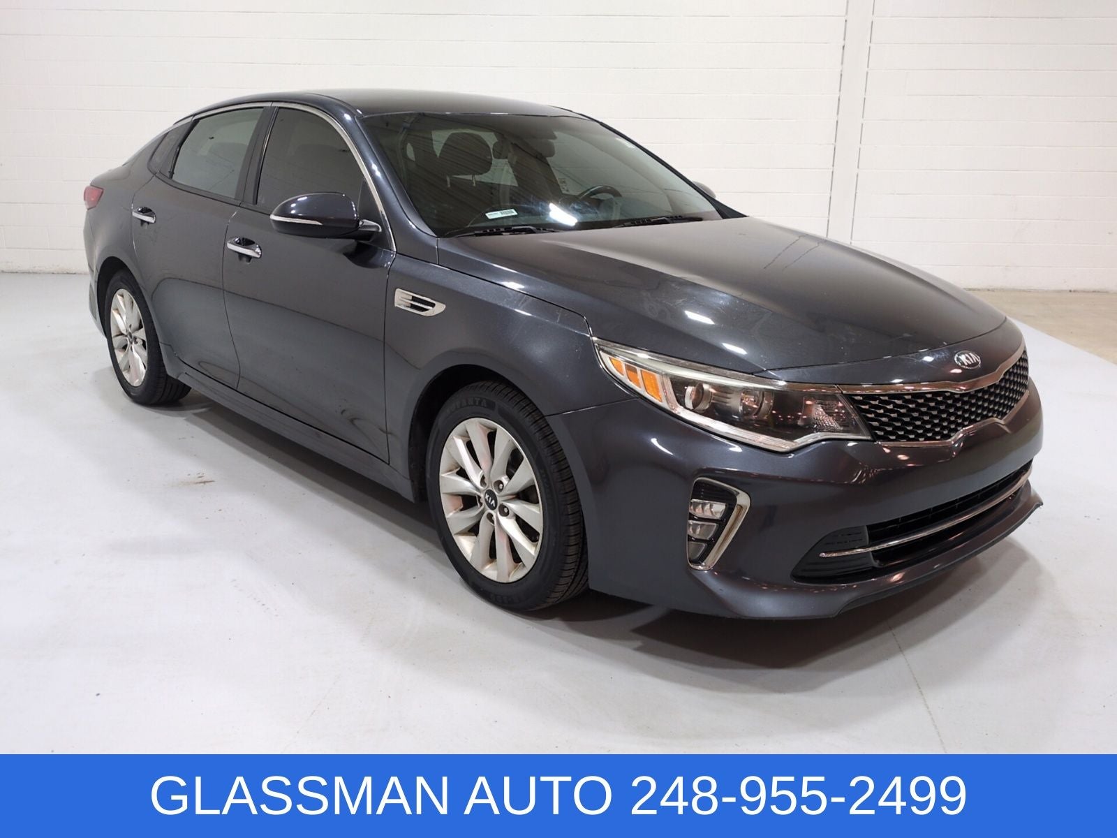 2018 Kia Optima S in Platinum Graphite — front three-quarter view
