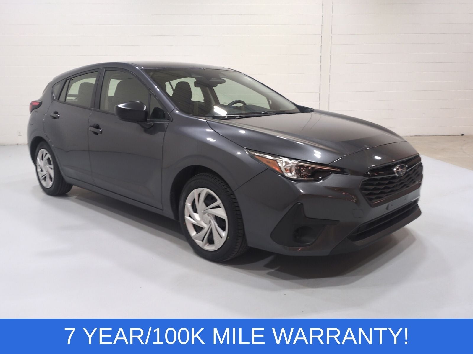 2024 Subaru Impreza Base in Magnetite Gray Metallic — front three-quarter view