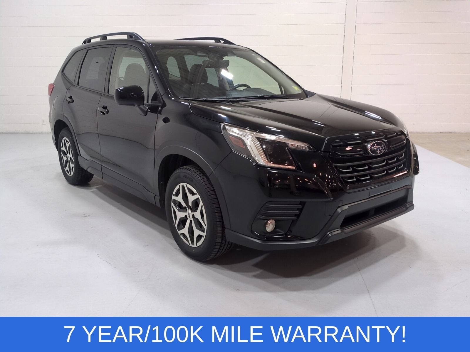 2023 Subaru Forester Premium in Crystal Black Silica — front three-quarter view