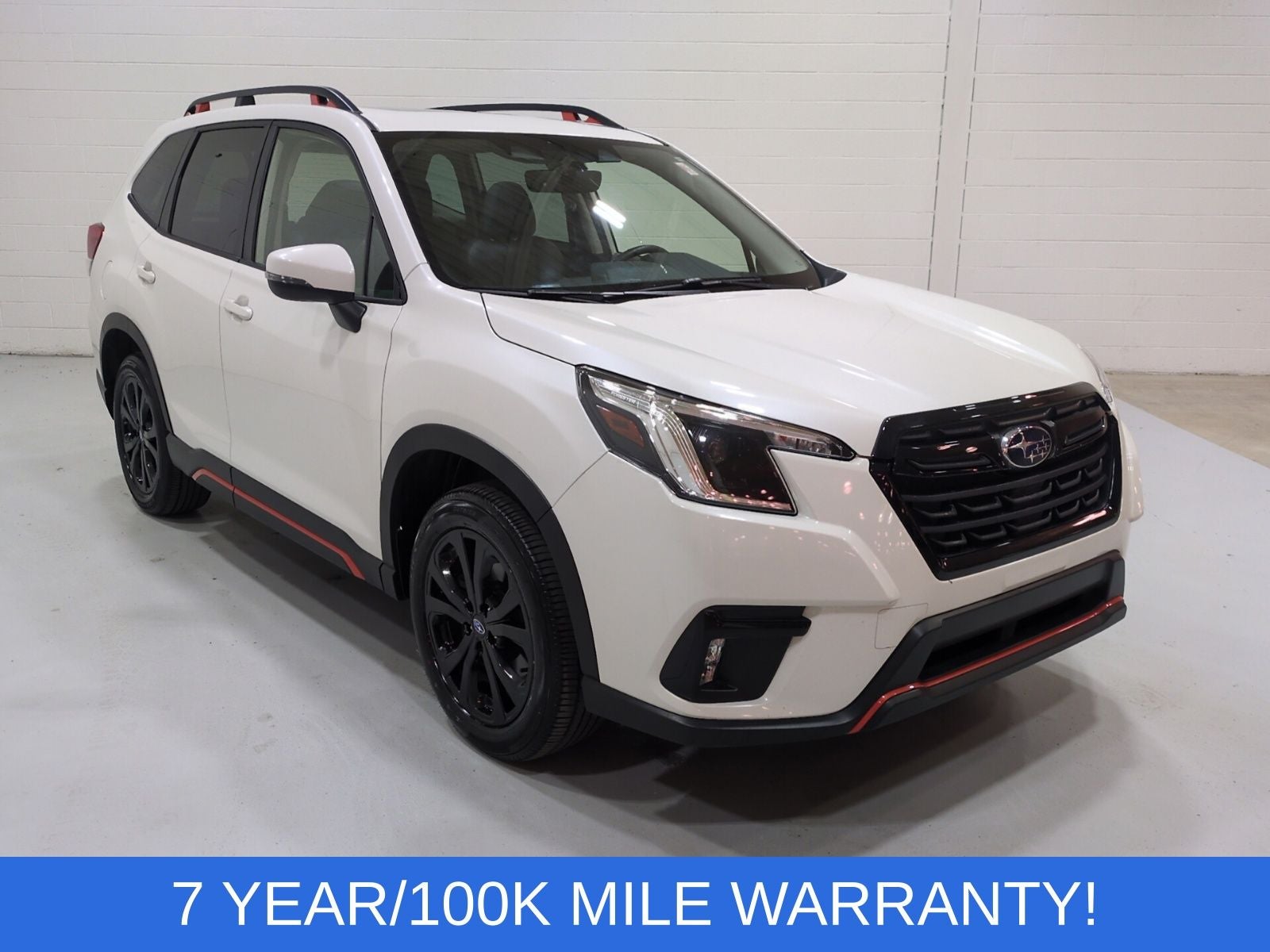 2024 Subaru Forester Sport in Crystal White Pearl — front three-quarter view