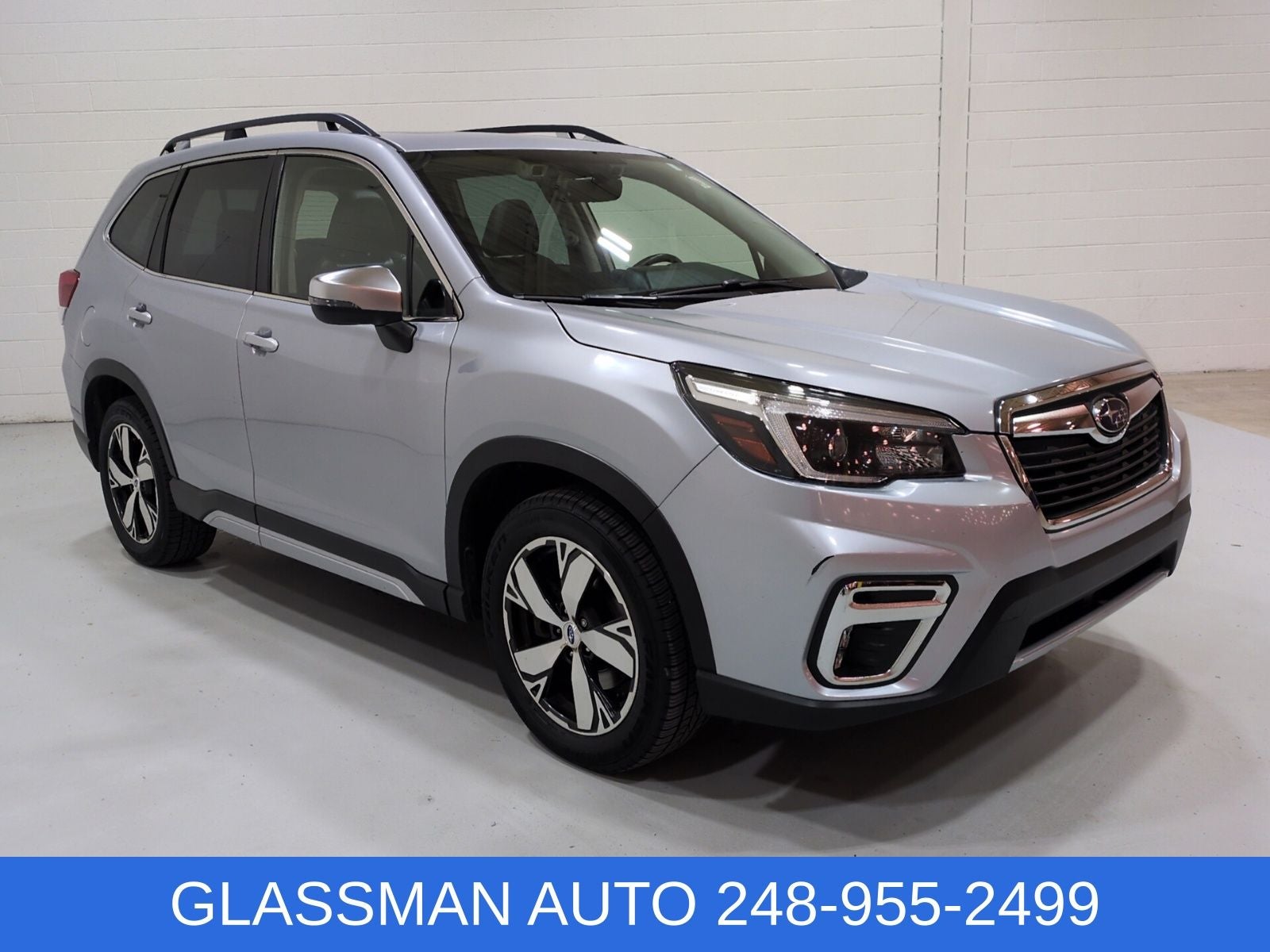 2021 Subaru Forester Touring in Ice Silver Metallic — front three-quarter view