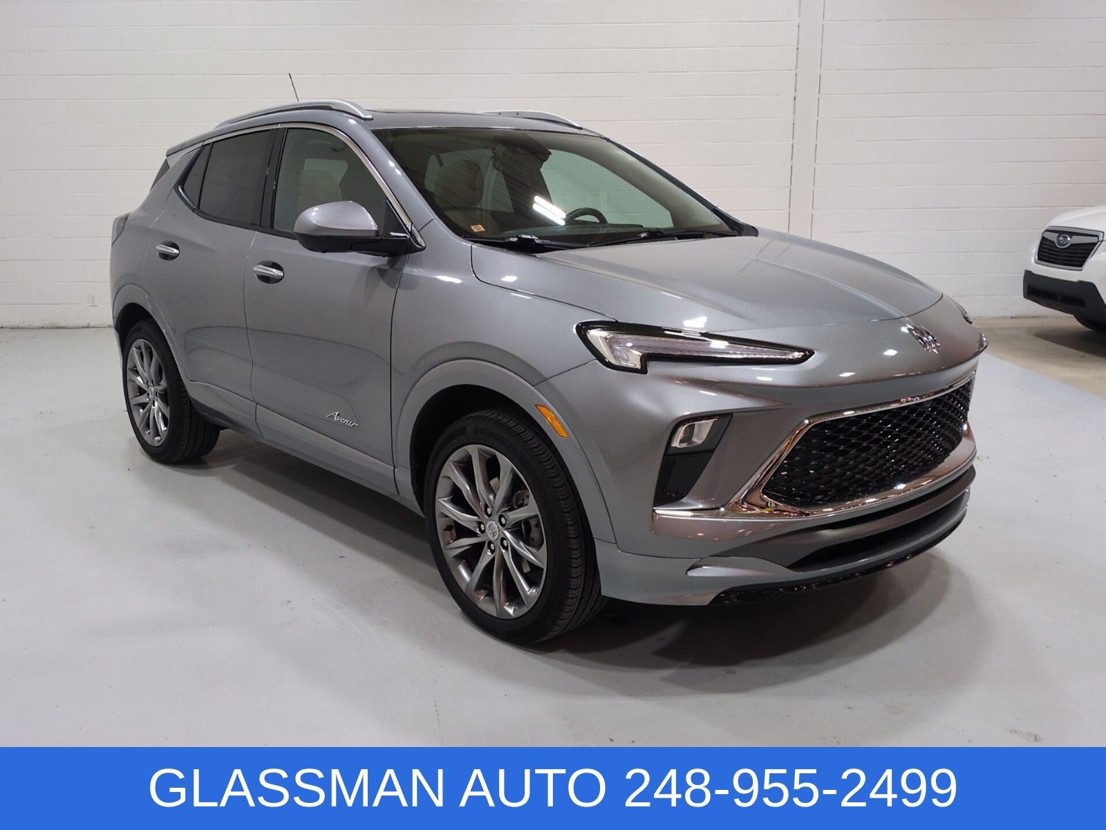 2024 Buick Encore GX Avenir in Moonstone Gray Metallic — front three-quarter view