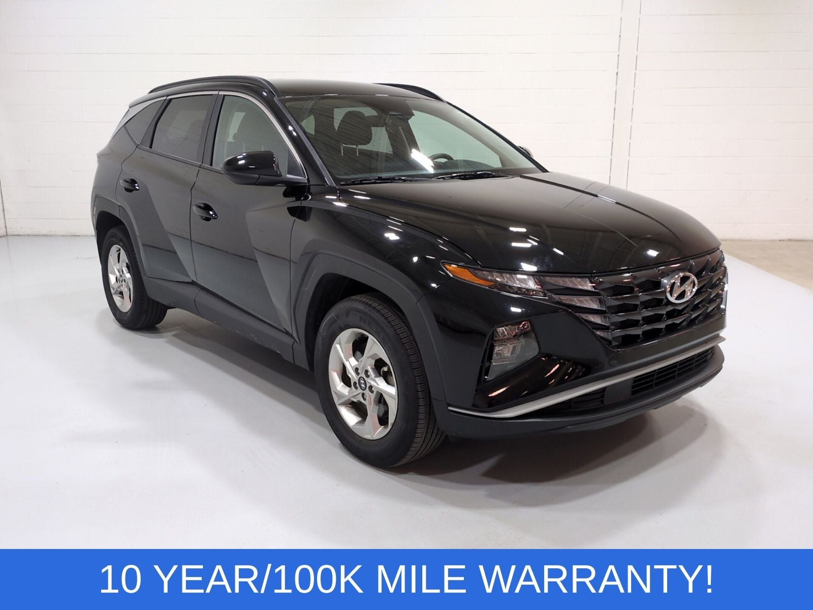 2024 Hyundai Tucson SEL in Black Pearl — front three-quarter view
