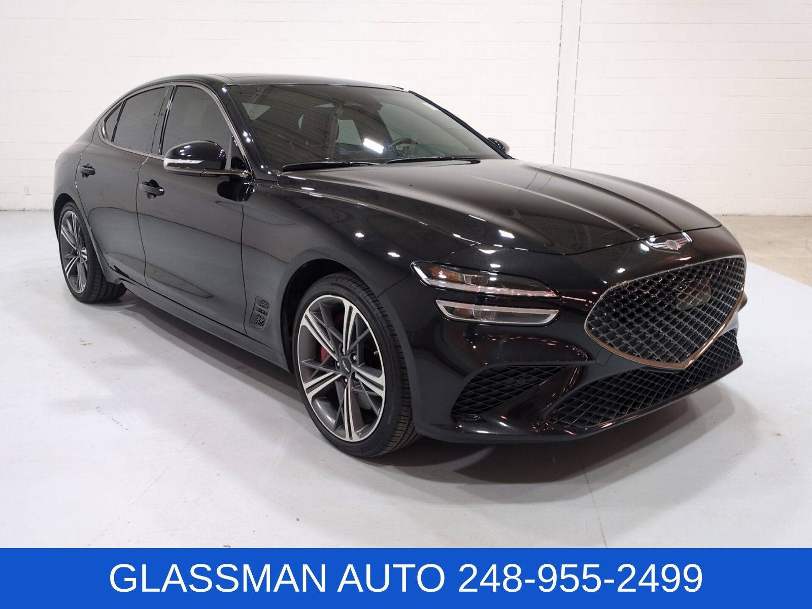 2025 Genesis G70 3.3T Sport Advanced in Vik Black — front three-quarter view