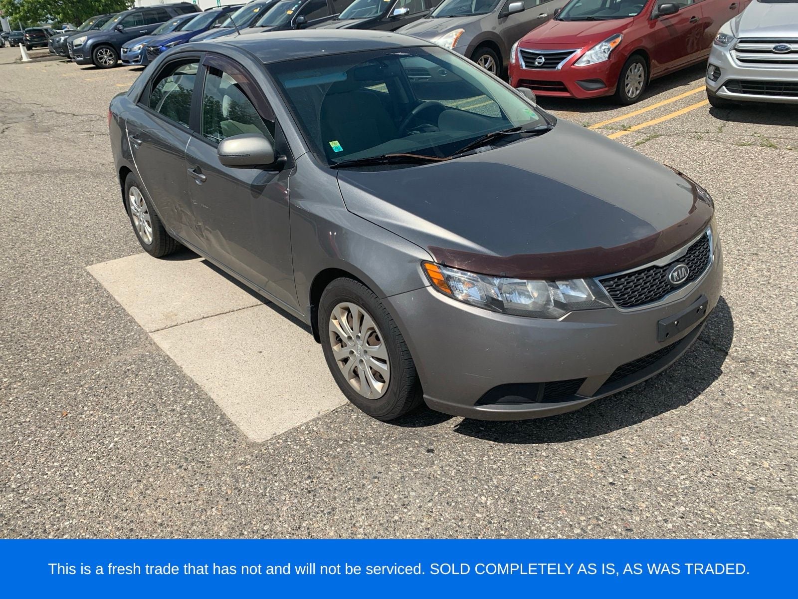 2012 Kia Forte — rear three-quarter view