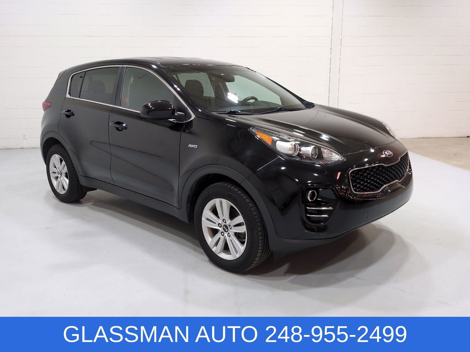2018 Kia Sportage LX in Black Cherry — front three-quarter view
