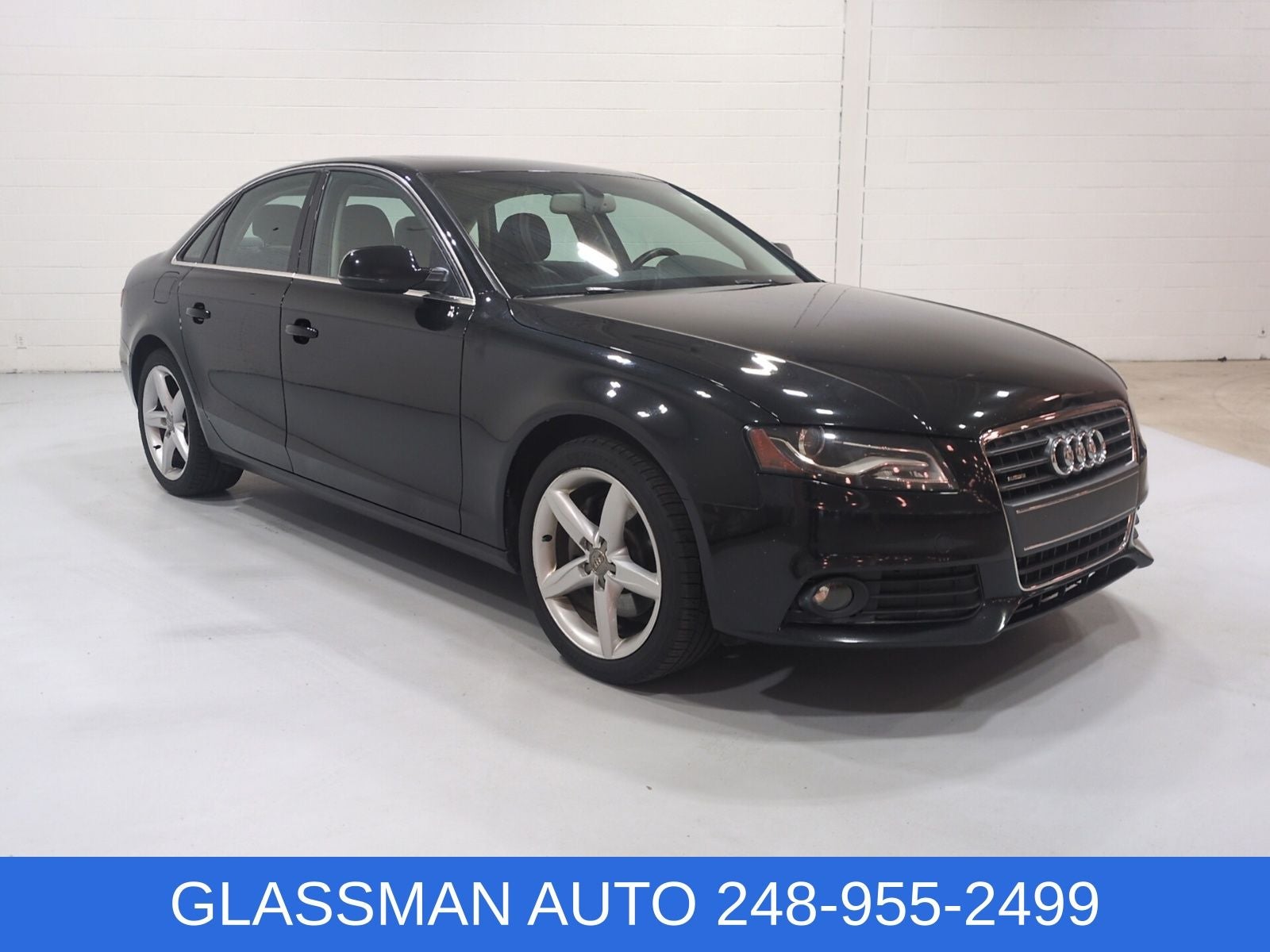 2011 Audi A4 2.0T Premium Plus quattro in Black — front three-quarter view